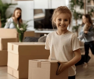 Child helping her mom in moving stuffs, Decluttering unnecessary items