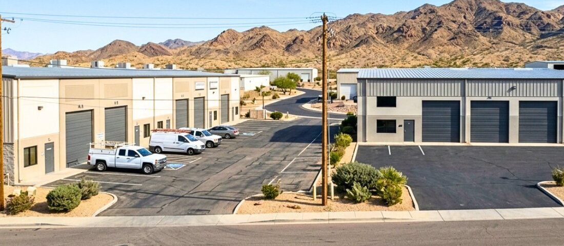 Occupied and vacant industrial buildings along a Lake Havasu commercial corridor